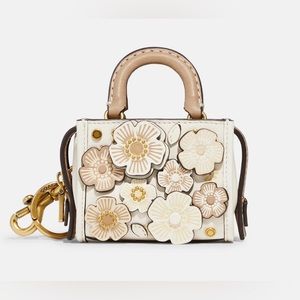 Mini Rogue Bag Charm With Tea Rose, metal strap chain.